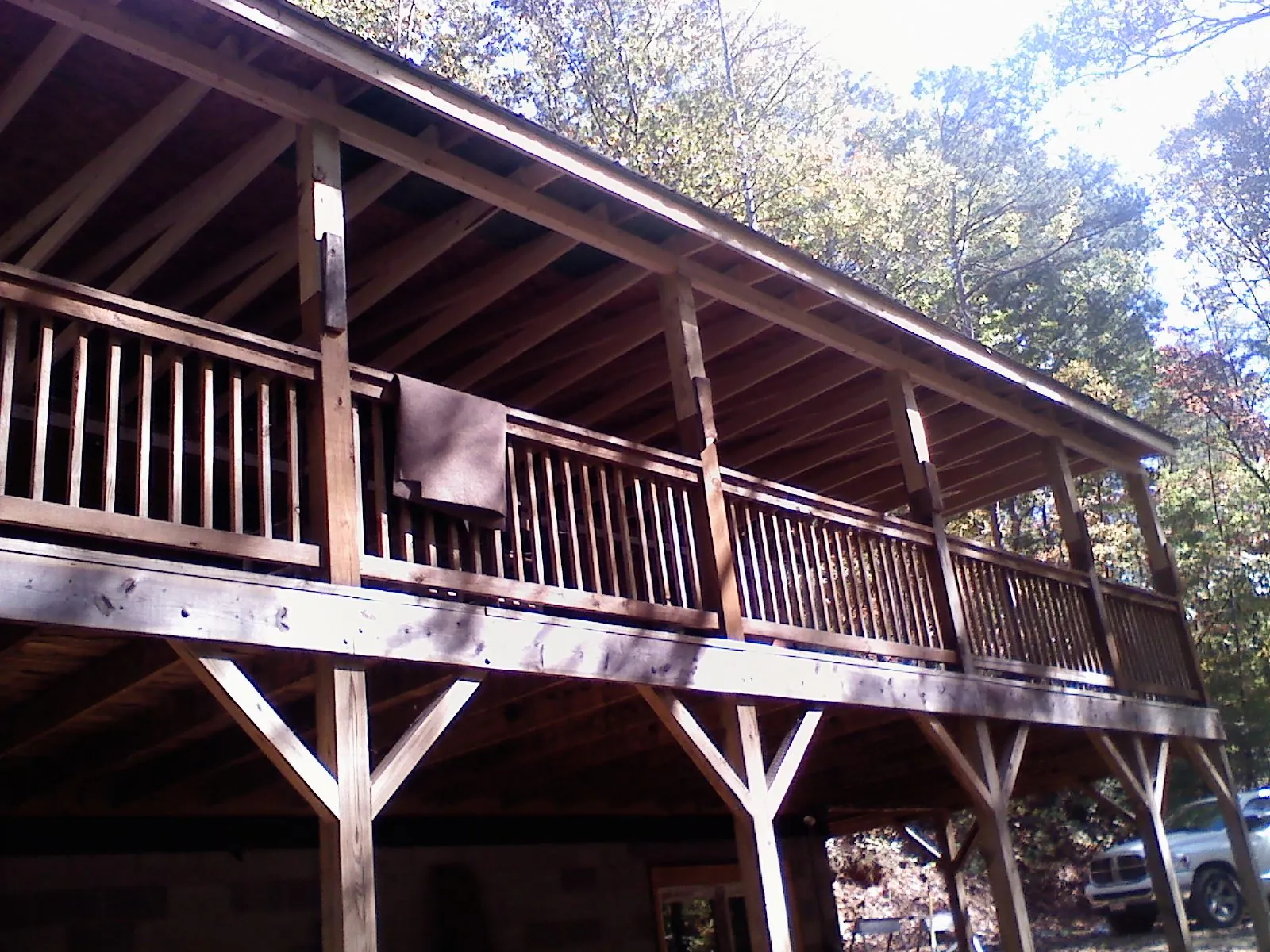 Timber framing under a new elevated porch and deck — Roof Leak Repair in Marsteller by Roofing Brothers